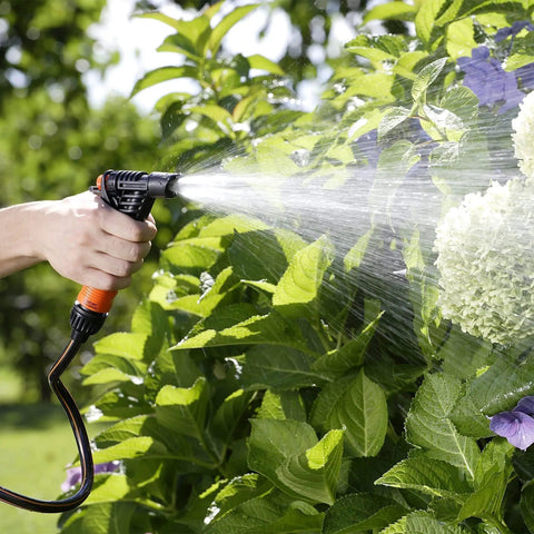 Professional Pistol Lance For Irrigation Systems, Heavy Duty Sprayer Attachment 8756 spraying plants, with black and orange design