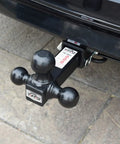 Tri Ball Hitch Mount For 2 Inch Receivers With 1-7/8 Inch, 2 Inch, And 2-5/16 Inch Black Tow Balls installed on vehicle