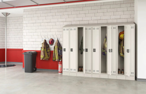 Wall Mount Coat Rack With Six Hooks For Coats Purses Bags And Umbrellas, Easy Install For Hallways And Entryways, Black Satin Aluminum Finish With Chrome Plated Hooks And Protective Ball Tips in a fire station with lockers and gear.