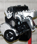4.0L Inline Six Engine Rebuild And Modification Guide with rebuilt Jeep inline-6 engine shown on stand