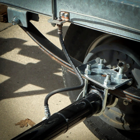 Installed Durable Rubber Brake Hose 3/16 Inch ID By 18 Inch Length With 3/8-24 Male To Female Swivel Fittings DOT Approved on trailer
