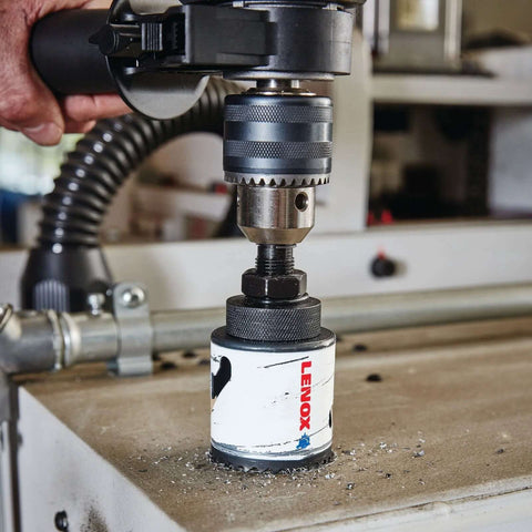 Lenox 2-3/4 in bi-metal speed-slot hole saw mounted on drill chuck (side view)