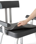 Hand adjusting cushioned seat of Momentum Shower Chair For Adults, Premium Non Slip Bath Seat With Adjustable Height, Armrests