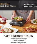 Roadready Electric Hot Plate Featuring Slick Cast Iron Cooking Surface Seven Speed Heat Dials Compact 1000 Watt Portable Burner in use with food.
