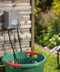 Solar Powered Automatic Drip Irrigation System With 50 Drippers And 155 Feet Of Tubing for Balcony Gardens next to a green basin