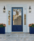 2 Light Outdoor Wall Lantern With Clear Beveled Glass, Traditional Farmhouse Style, Textured Black Finish flanking blue door