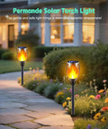 Solar Torch Lights With Flickering Flame Realistic Fire Effect For Outdoor Garden And Patio Easy Setup No Fuss Auto On Off Dust To Dawn Waterproof Landscape Decoration Solar Powered Security Torch Light Pack Of Four lighting a garden path at night.