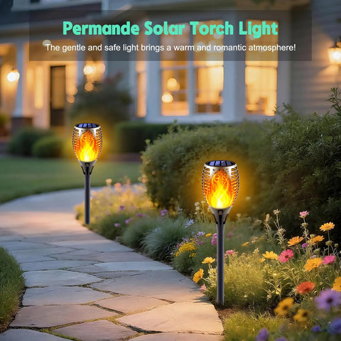 Pathway with Eight Pack Solar Torch Lights With Realistic Flickering Flame For Outdoor Vibe And Ambience illuminating garden flowers