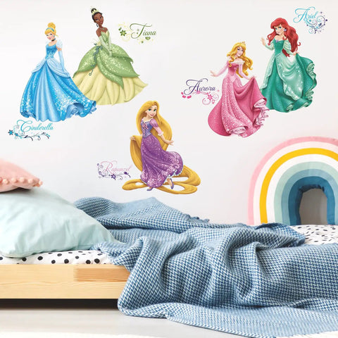 Disney Princess Peel And Stick Wall Decals Set With 37 Pieces From 2.3 X 1.6 To 8 X 9.5 Inches Easy To Apply And Removable With No Residue Made In The Usa Kid Friendly And Totally Adorable For Nurseries And Kids Rooms showing princesses on wall above bed