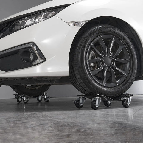 Heavy Duty Car Wheel Dollies Moving Cart With Locking Brakes supporting a car, showcasing 6000 lbs capacity and 3 inch casters.