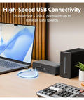 Badass Thunderbolt 5 Dock With Built In Ssd Enclosure, 120Gbps Desktop Hub For Mac And Pc, Thunderbolt 5 USB-C ports on desk setup, laptop and dock.
