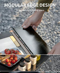 Height Adjustable IGT Camping Table With Detachable Edge Mount For Extra Storage showing modular edge design with food items