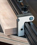 Professional Grade Miter Saw Jig Delivering Dead Nuts Accurate Cuts Without Any Sweat angle guide mounted on wood.