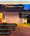 LED Outdoor Flood Light 10W Hardwired Spotlight illuminating garage with text on installation details, warm white glow