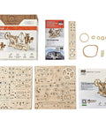 Tachometer Model Kit For Adults, Hands On Wooden STEM Puzzle components and assembly instructions spread out.