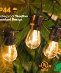 50Ft LED Outdoor String Lights With 16 Shatterproof S14 Replaceable Bulbs 2700K Warm White For That Cozy Vibe in rain, close-up view