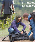 People using Portable Camping Fan With LED Lantern 8 Inch, Rechargeable 10000mAh Battery during outdoor hiking trip.