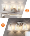 Three Light Bathroom Vanity Light Fixtures Over Mirror In Brushed Nickel Finish with Crystal Glass Shades and Oval Backplate