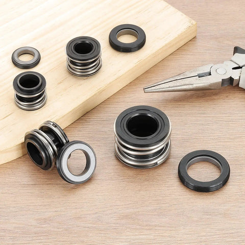 Two Pack Mechanical Seal Kit For Water Pumps, 17mm Inner Diameter And 33mm Outer Diameter Rubber Shaft Seals, Replacement Kit For 0.7 Inch Shaft Pumps, High Temp, Durable Pump Seal Set That Holds Up. Mechanical water pump seals on wood surface