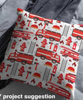 Cushion covered in Red Fire Truck Theme Fabric For Kids Sewing Decor With Fire Hydrant And Extinguisher Prints By The Yard Waterproof Polyester For Indoor Outdoor Use Kid Friendly Craft Material That Washes Easy And Stands Up To Play on a bed.