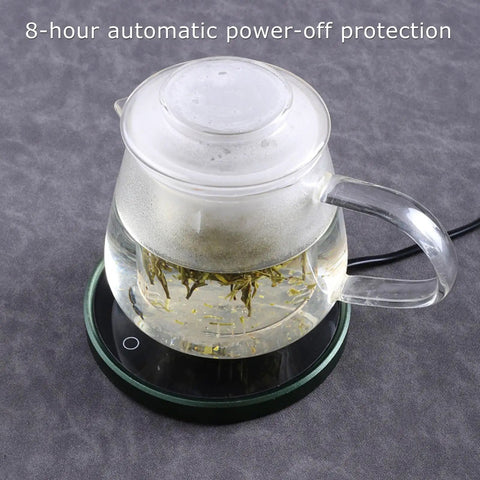 Slim Electric Desk Coffee Mug Warmer And Portable Bottle Cooler Holds A Steady 55 Celsius With A Featherlight 13mm Body And Totally Leakproof Seal So Your Morning Brew Hits The Spot Hella Smooth All Day Long - Glass teapot with built-in warmer features a lid and a floral tea infusion.