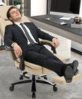 Man reclining in 500lbs Capacity Big And Tall Office Chair with Lumbar Support PU Leather Heavy Duty Reclining Chair with Foot Rest