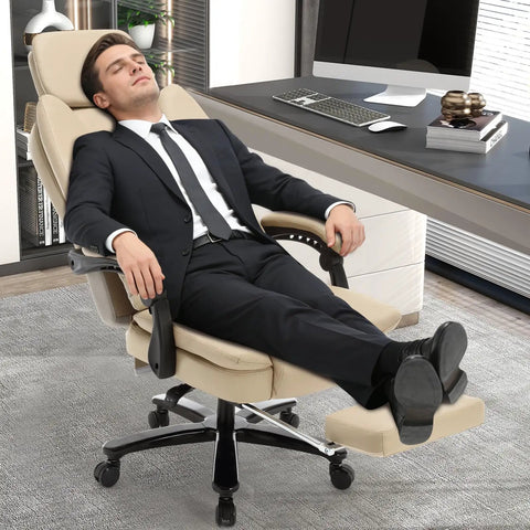 Man reclining in 500lbs Capacity Big And Tall Office Chair with Lumbar Support PU Leather Heavy Duty Reclining Chair with Foot Rest