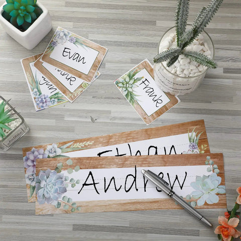 48 Pieces Rustic Bloom Name Tags Self Adhesive Labels With Succulent Theme for Desk Bulletin Boards and Classroom Decor shown on table