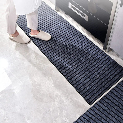 Solid Coffee Tamping Station With A Slick Integrated Espresso Knock Box And Grippy Portafilter Holder Tailored For 58Mm Barista Mats on kitchen floor.