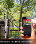 Person holding smartphone to control Game Changing Solar Automatic Gate Opener Designed For Heavy Duty Outdoor Chain Link And Wood Gates Up To Sixteen Feet With Slick Remote Controller Full System Kit.