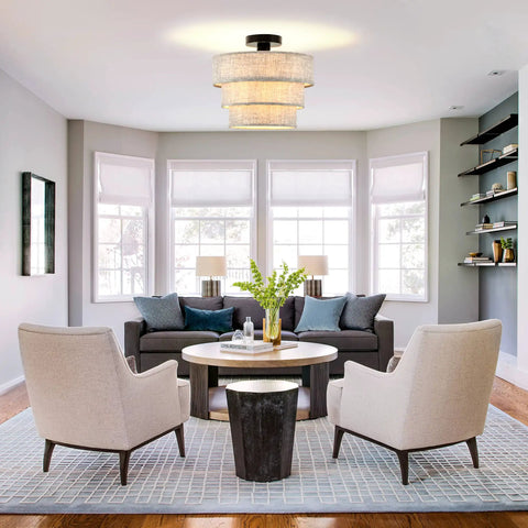 Three Tier Linen Drum Shade Semi Flush Mount Ceiling Light Fixture in living room with cozy diffused glow over seating area