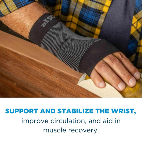 Person sanding wood wearing WS6 Compression Wrist Sleeve for Carpal Tunnel Relief and All-Day Pain Support, Reducing Strain and Fatigue.