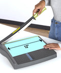 ClassicCut Lite 12 Inch Guillotine Paper Cutter with user demonstrating 12-inch cutting length and sturdy plastic base.