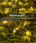 Solar Powered Outdoor Fairy String Lights 39Ft 100 LED Waterproof Twinkle With 8 Modes And Memory Function glowing on grass.
