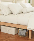 Built Different Twin Xl Wood Bed Frame With Solid Rubberwood Platform Base showcasing bedding and storage beneath.