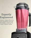 Real Deal Kitchen Workhorse Professional Grade Blender With Sixty Four Ounce Container Killer Motor For Smooth Consistent Blends Perfect Soups Sauces And Frozen Desserts Quick Rinse Clean Matte Black with vibrant smoothie in jar.