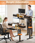 GIFZES Electric Standing Desk With 10 RGB LED Lighting Modes And Power Outlets For Gaming Or Office Setup height adjustable from 28.3 to 46.5 inches.