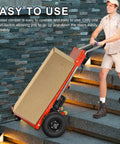 Camini 1200W Electric Stair Climbing Hand Truck Dolly With 880 Lb Heavy Load Capacity on stairs, easy operation with a cargo box.