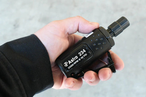 Compact Micro Die Grinder One Quarter Inch Shank 25000 Rpm High Power Rotary Tool held in hand for precision work.