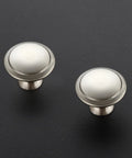 Kick Up Your Cabinets With These Fresh Brushed Nickel Knobs Breezy Install Hardware Kit Includes Mounting Screws Top view of two round brushed nickel drawer knobs.