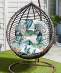 Waterproof Hammock Egg Chair Cushion For Indoor Outdoor Use with floral pattern in hanging basket on patio.