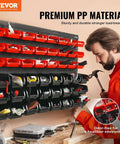 Man installing 48 Bin Wall Mounted Storage Bins Rack Organizer for Garage and DIY Shop Tools on a wall with durable wall panels