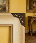 Solid As A Rock Metal Corner Protectors For Furniture Featuring Dope Vintage Floral Accents Seriously Rust Resistant Heavy Duty Edge Guards keep corners safe on a wooden frame.
