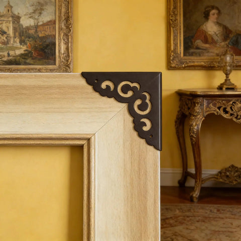 Solid As A Rock Metal Corner Protectors For Furniture Featuring Dope Vintage Floral Accents Seriously Rust Resistant Heavy Duty Edge Guards keep corners safe on a wooden frame.