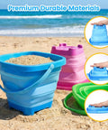 Three Pack Collapsible Buckets For Kids Foldable Sand Pails shown in blue, green, pink on beach with sand, demonstrating collapsibility.