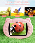 1080P 4K handheld digital microscope showing ladybug on screen, designed for kids, with cat-shaped buttons on green grass.
