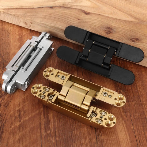 Heavy Duty Six Inch Hidden Door Hinges Two Pack Three Way Adjustable Invisible Concealed Hardware With Sleek Gold Finish displayed on wood.