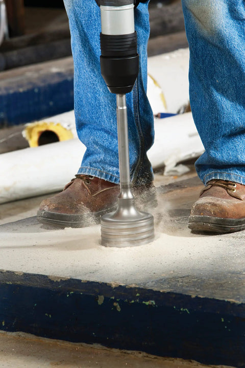 Beefy SDS Max Rotary Hammer Core Bit 4 In By 12 In With Wave Design drilling into concrete floor