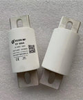 High Voltage DC Fast Fuse For Electric Vehicles With 500 Amp And 800 Volt Rating featuring ceramic housing on a white background.