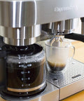 Close-up of Stainless Steel Espresso And Coffee Maker Duo Brew Kit With 10 Cup Capacity 19 Bar ULKA Pump on a counter